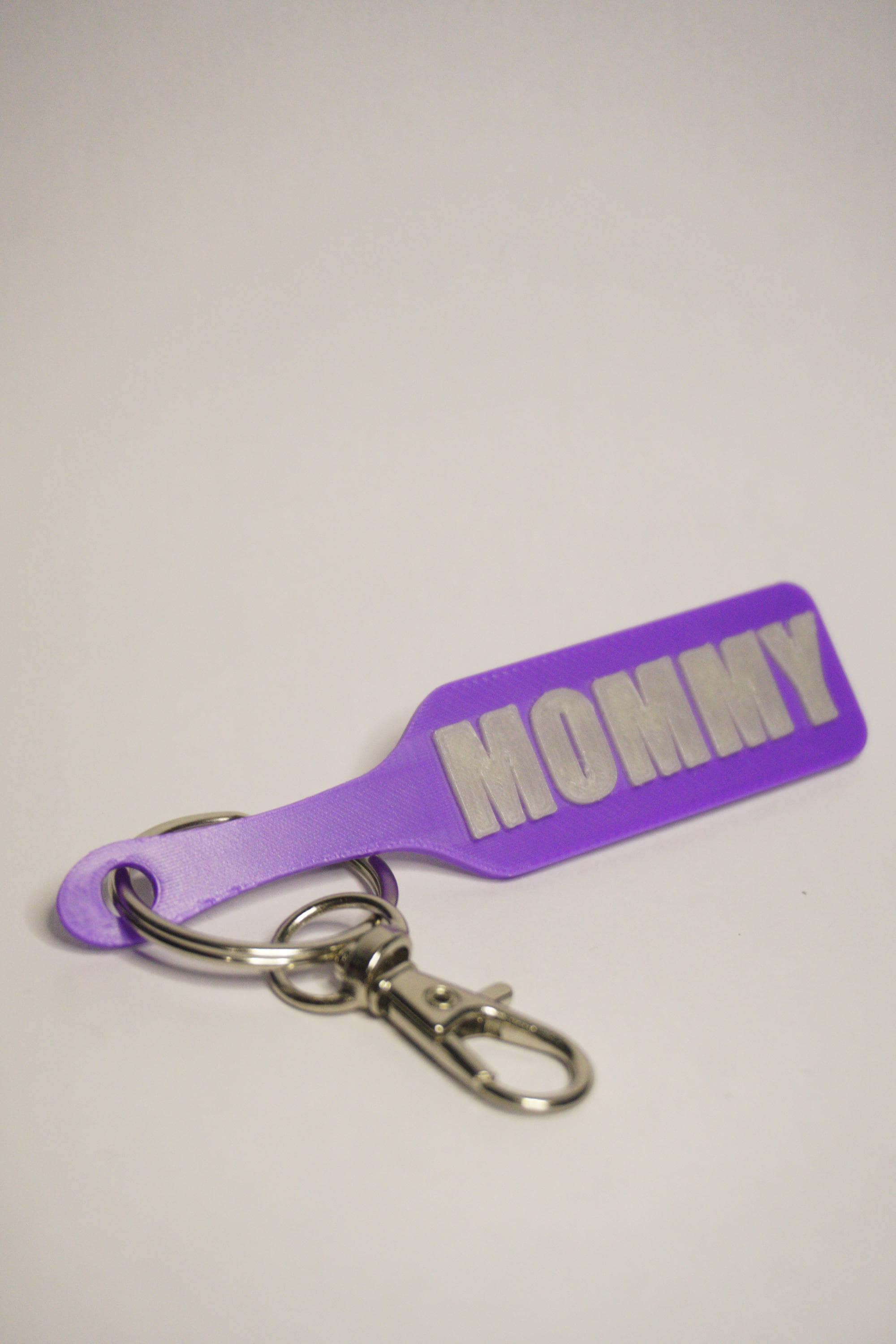 MOMMY Paddle Keychain - Jester Collection (Glowy Green & Purple)  - Kinky BDSM 3d-Printed Accessory (etsy image id: 8043530459)